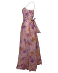 NAAMA ATHENS pink floral print maxi dress with sweetheart neckline, spaghetti straps, and tie-waist belt.