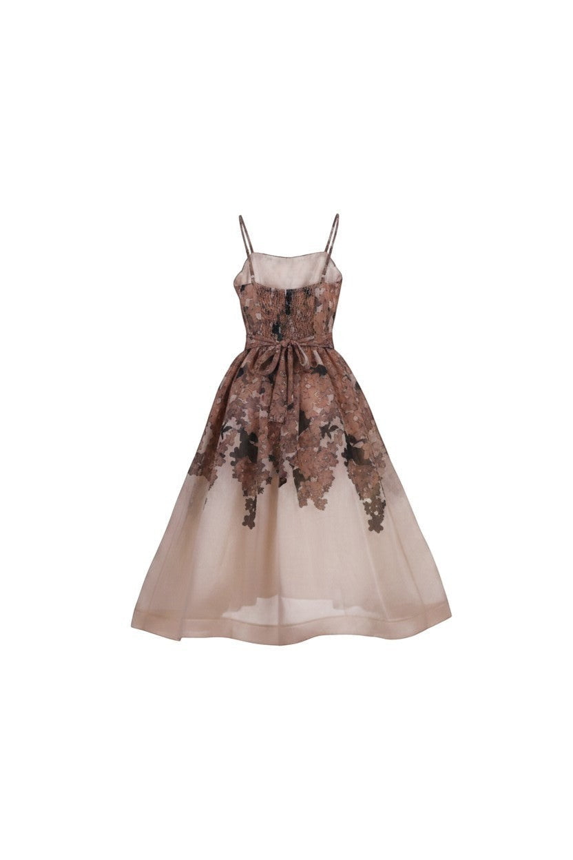 NAAMA ATHENS floral organza midi dress with sweetheart neckline, spaghetti straps, and tie-waist in a beige tone.